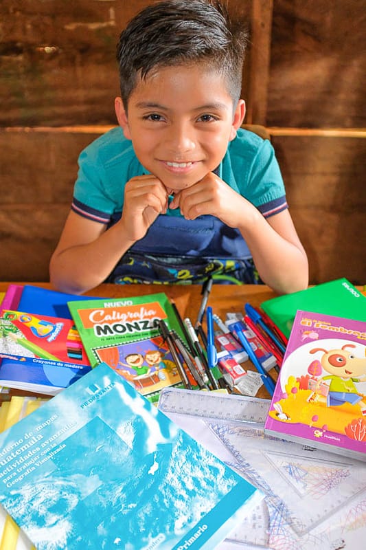 BoyWithSchoolSupplies-small