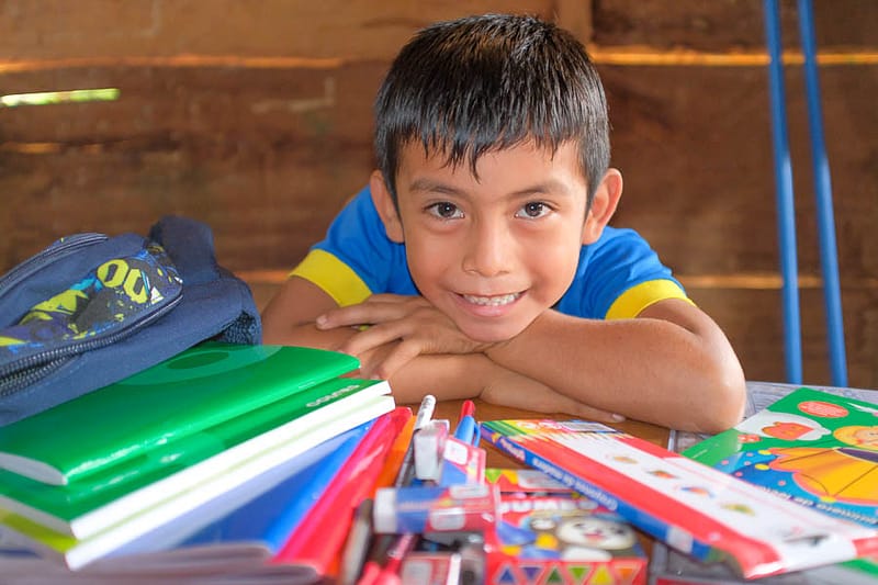 BoyWithSchoolSupplies